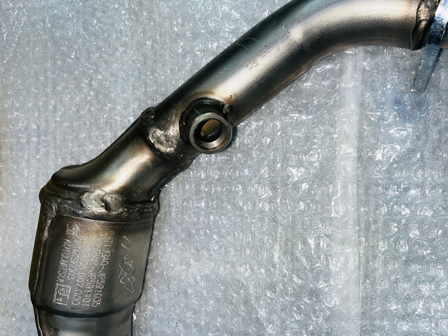 ADVENTURE 390 EXHAUST BEND PIPE Part no:- JP591010